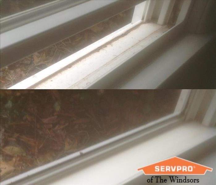 Blended picture of a half open window before and after cleaning with SERVPRO of The Windsors Logo