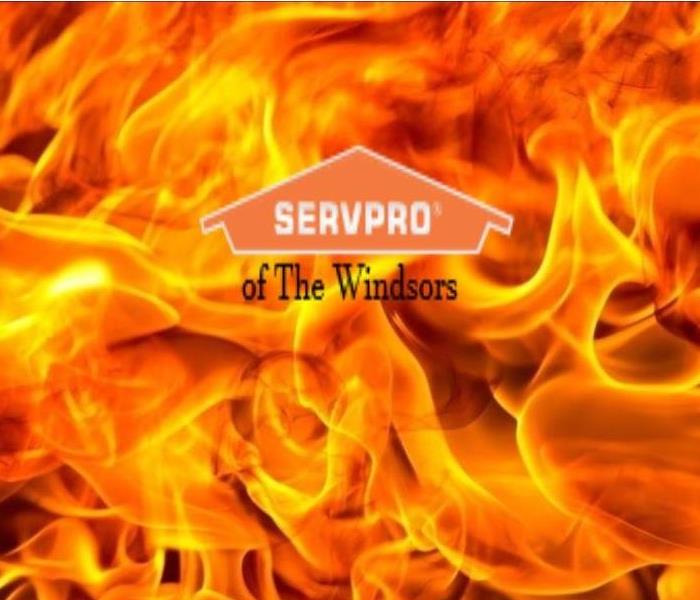 servpro logo in front of flames, all orange and black