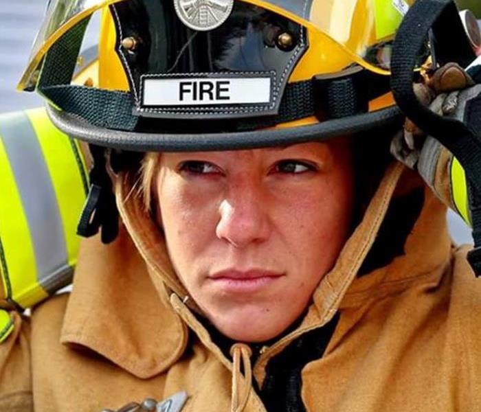 female fire fighter in emergency response gear, CT
